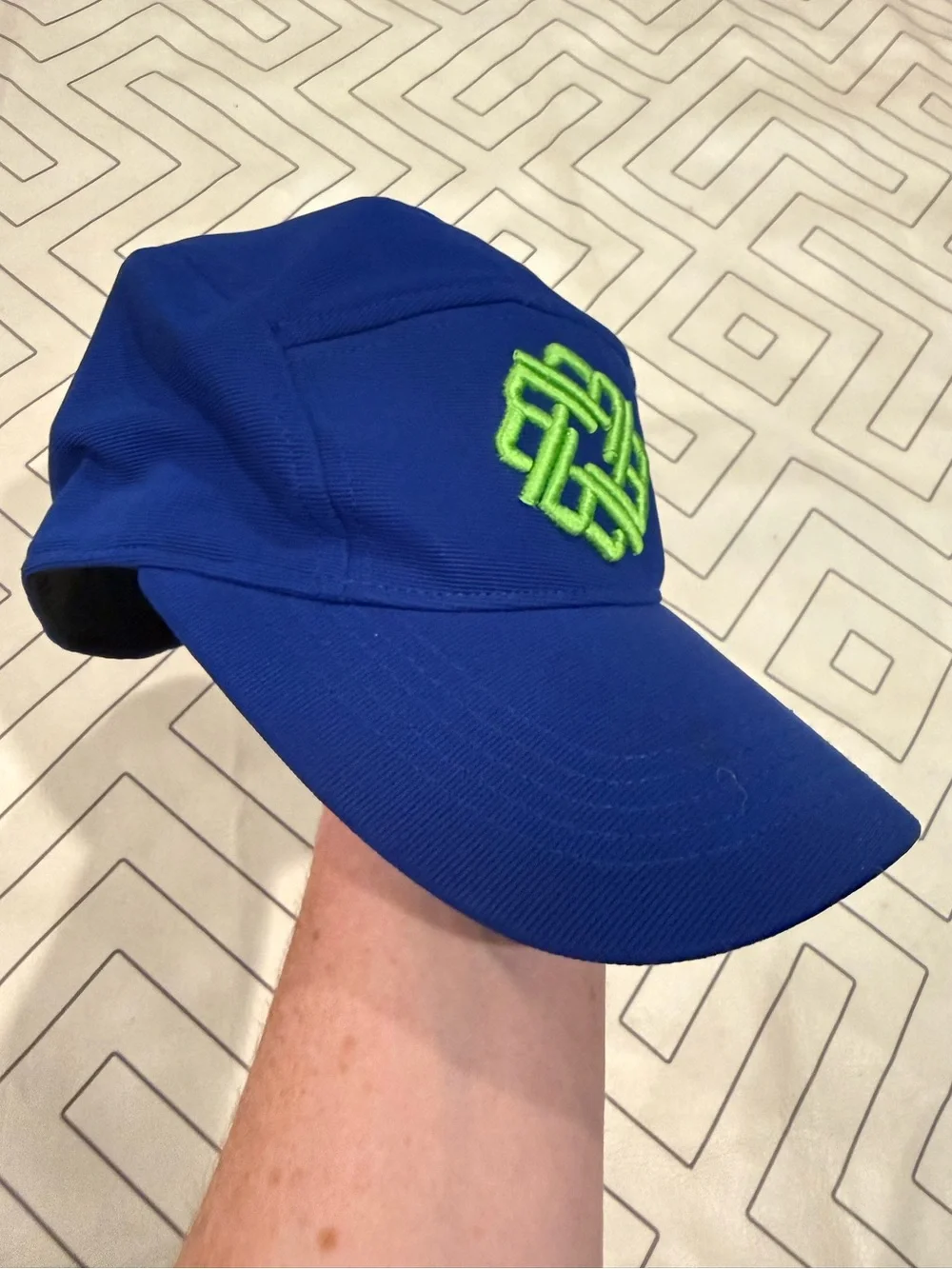 Betenly Blue Athletic Cap with Neon Green Knot Logo
